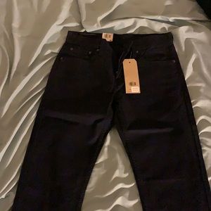 Dark blue Levi’s jeans